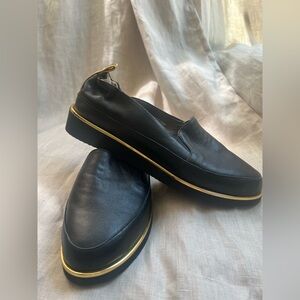 Ron White Niki ( weatherproof) Sleek Black Leather Loafers with Gold Accent